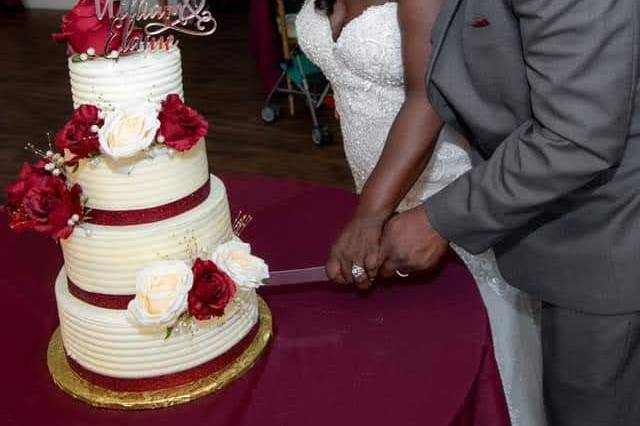 Elaine and William cutting cake