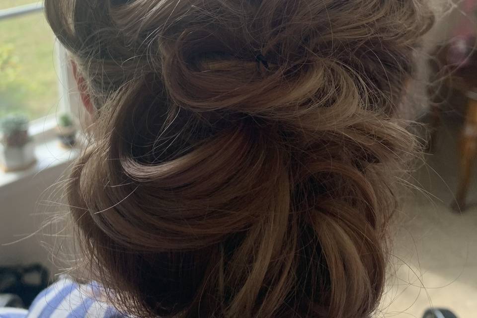 Loose updo and to the side