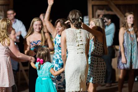Guests dance the night away under the fairy lights strung in the barn at Rocklands Farm. (Courtesy Audra Wrisley Photography)