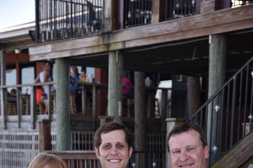 Newlyweds and the officiant