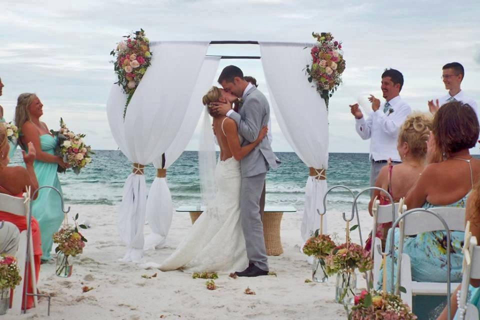 Beach wedding kiss