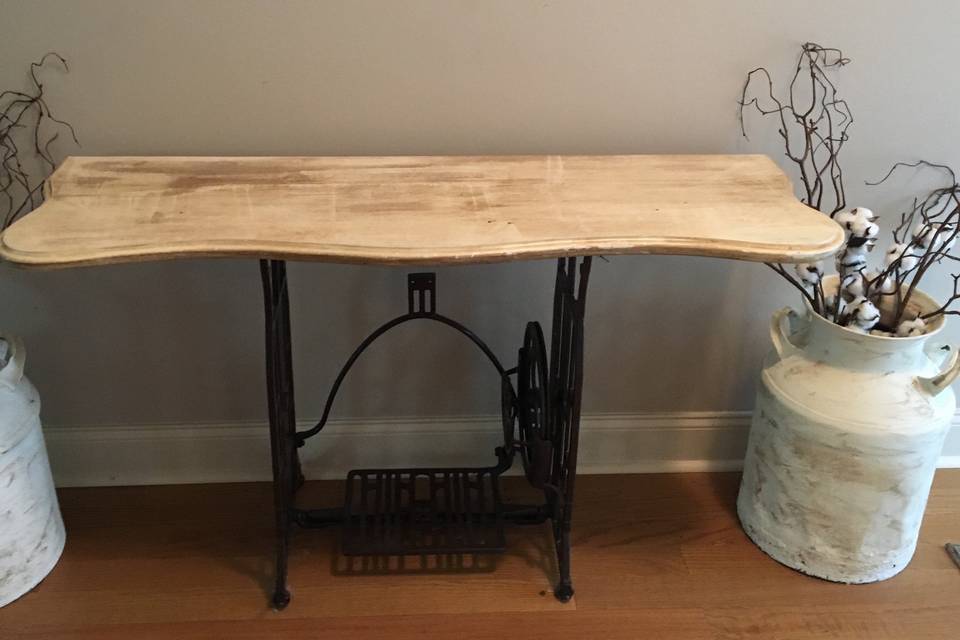 Table made with an antique sewing machine stand... $75 rental fee