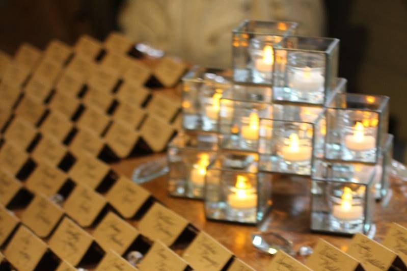 Escort card table with candles