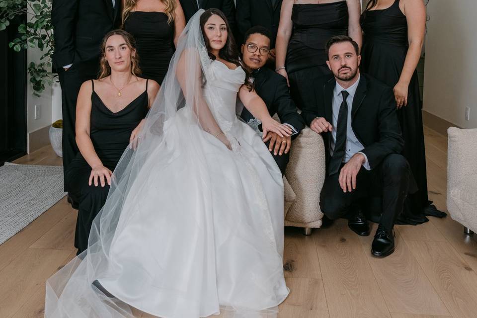 Bride and groom with bridal pa