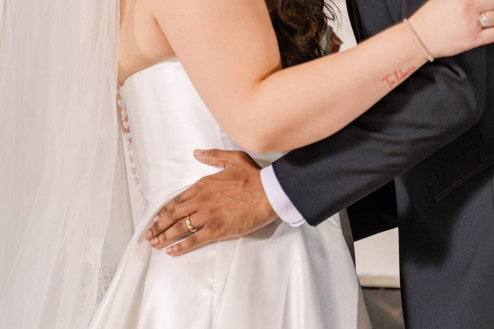 Bride and groom first kiss