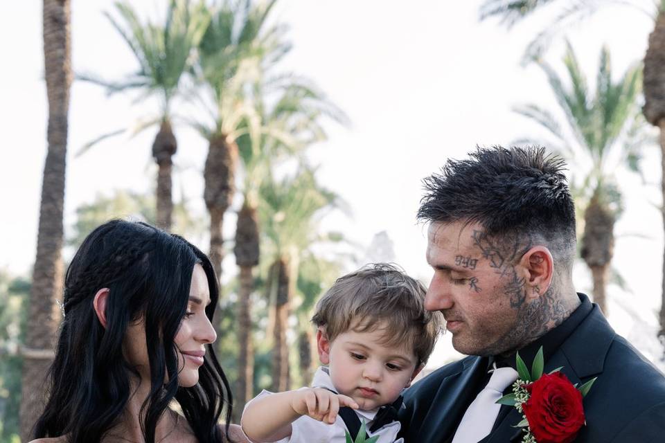 Bride and groom with son