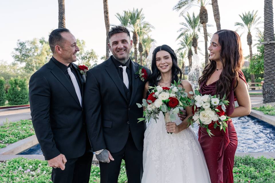 Bride and groom with party