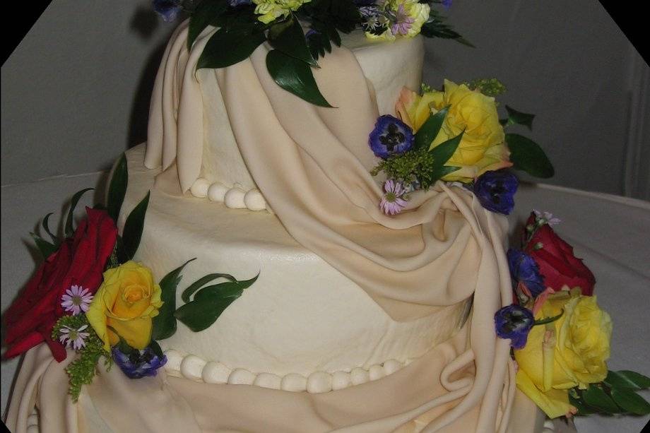Cake with drapes and flowers