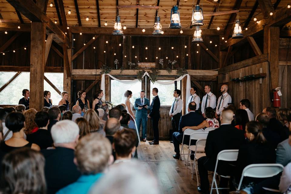 Ceremony inside barn
