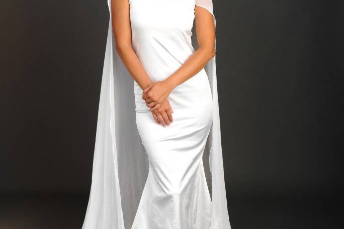 Style: Colette
Ivory Stretch silk satin sheath gown with detachable silk crinkle chiffon cape