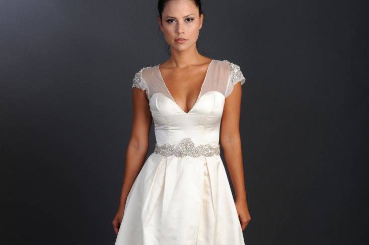 Style: Dunrobin
Silk duchess stain sweetheart neckline with organza ball gown, embellished shoulder and waist detail