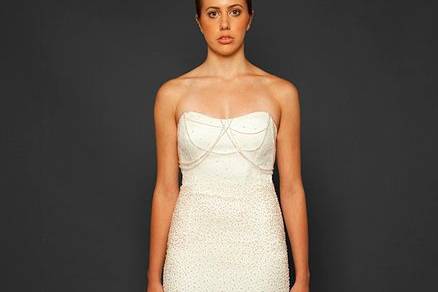 Style: Perla
Strapless embellished Swarovski crystal and pearls sheath gown with draped crystal strands across bodice