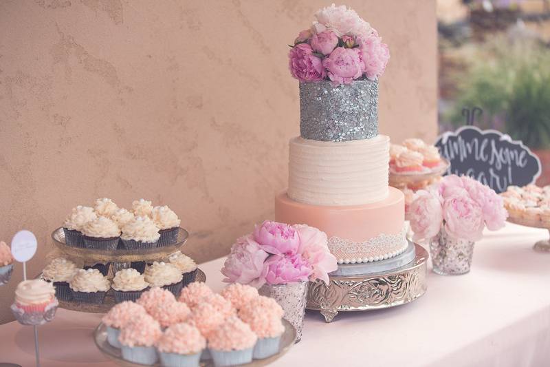 Wedding cake and cupcakes