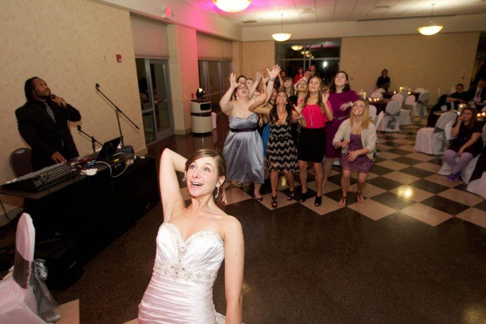 Bride tosses her bouquet