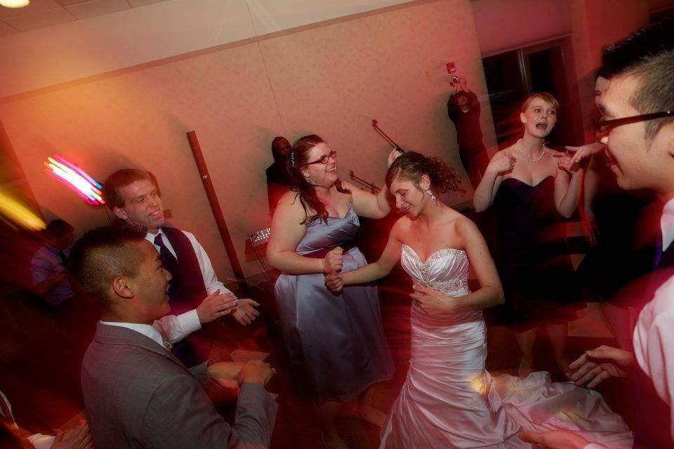 The couple dancing with their guests
