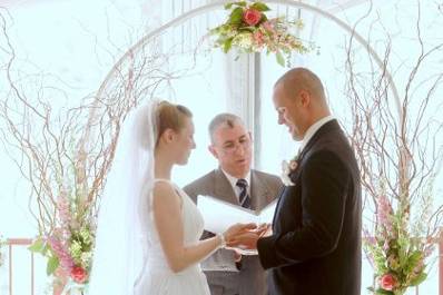 Couple with the officiant