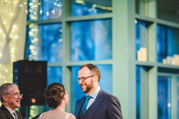 Couple with the officiant