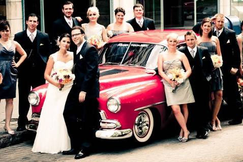 The couple with the bridesmaids and groomsmen