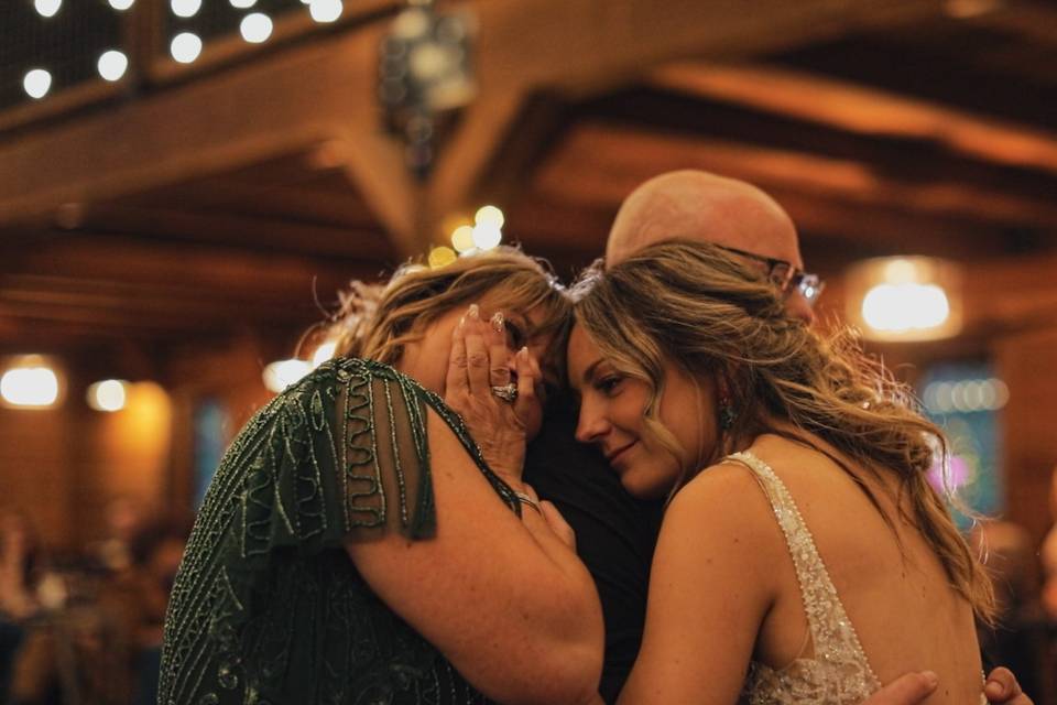 Father, mother, bride dance