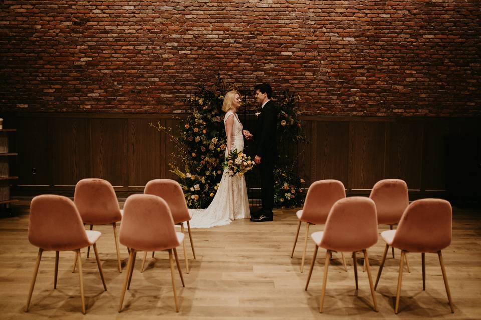 Newlyweds in an intimate wedding setup