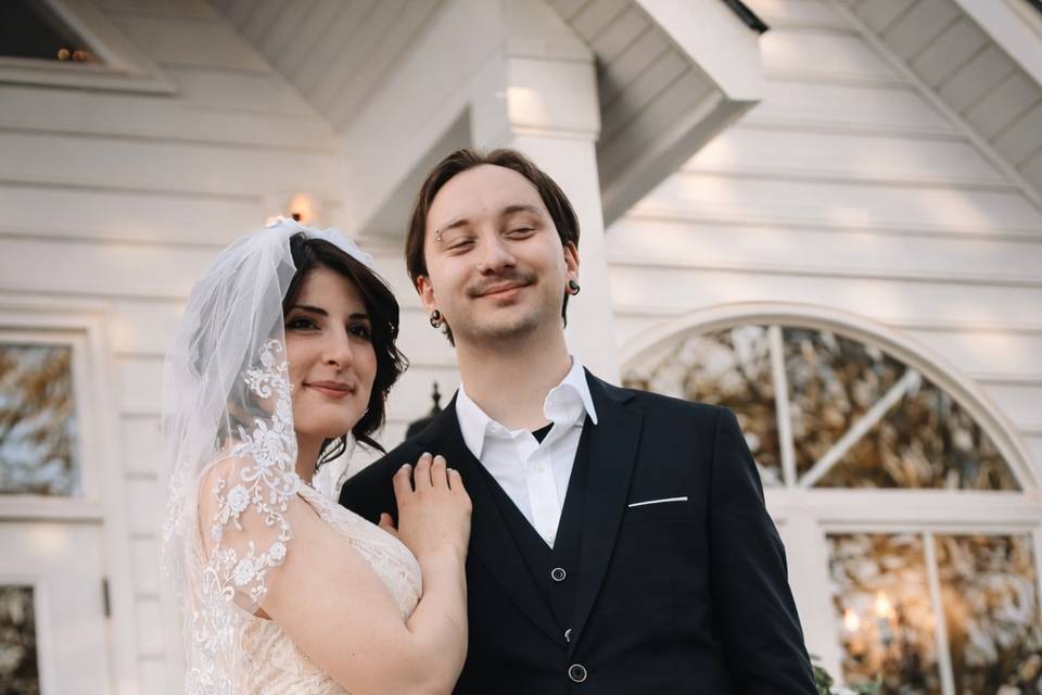 The bride and groom share a pr
