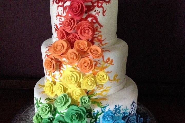 Fondant covered cake with hand-sculpted roses - $4.25 per serving