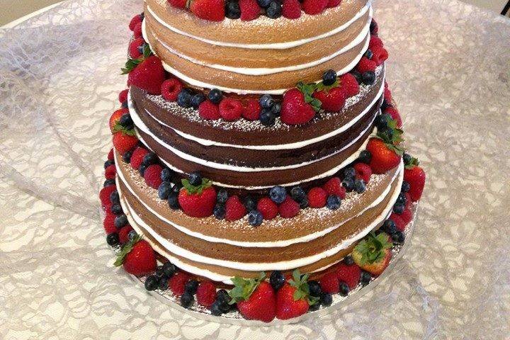 Naked cake with fresh fruit- $2.50 per serving ($2.75 for 5+ tiers)