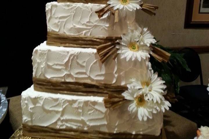Buttercream frosted cake - $2.50 per serving ($2.75 for 5+ tiers)