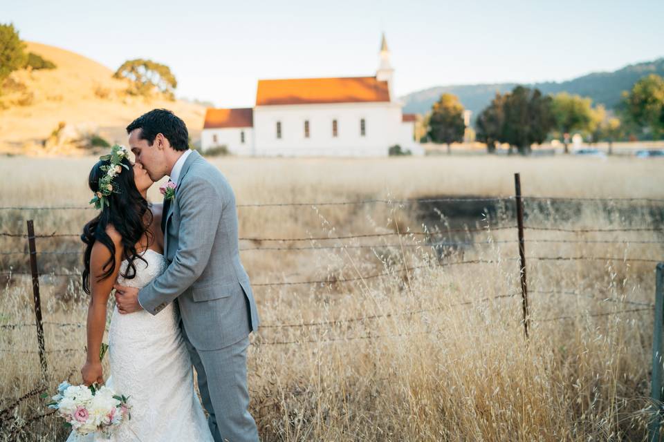 Newlyweds kissing