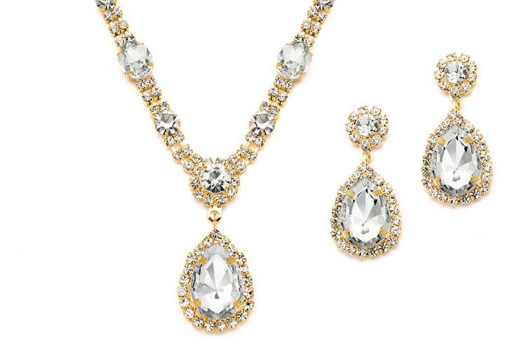 Our elegant necklace and earrings set has the look of real gold and diamond jewelry. The necklace adjusts from 13