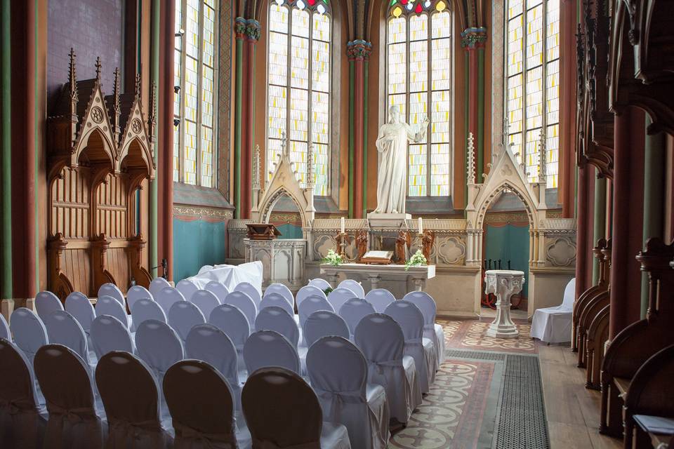 Piano hidden underneath a sheet to surprise the wedding couple at the processional!