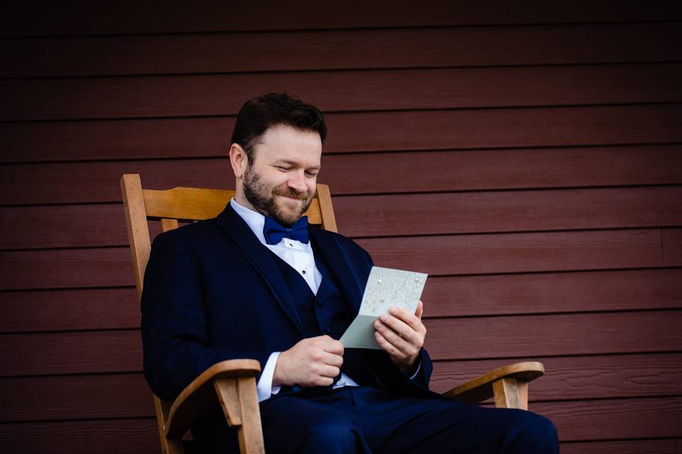 Groom reading his letter