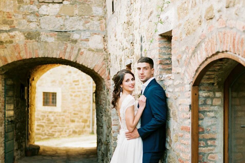 Tuscany bride, with a low updo.Published and Featured on the Wedding Sparrow. Photo by Justina Bilodeau