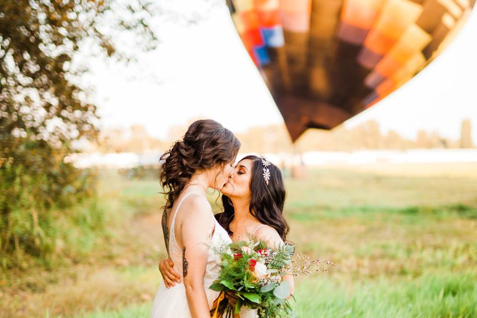 Hair and Makeup for both brides by Alise. Photo credit: Kristina Lord Photography