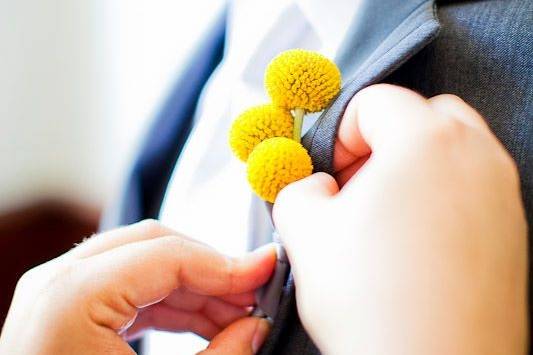 Pinning the boutonniere