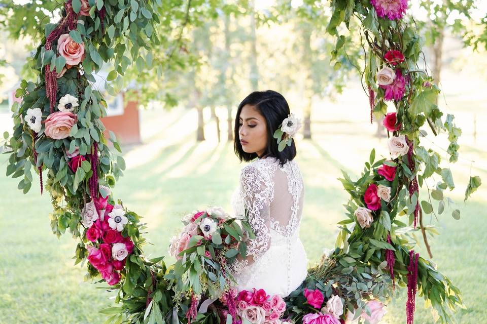 Bride on a floral swing