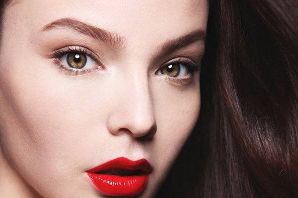 Red satin lips for a pop of color on this classic look.