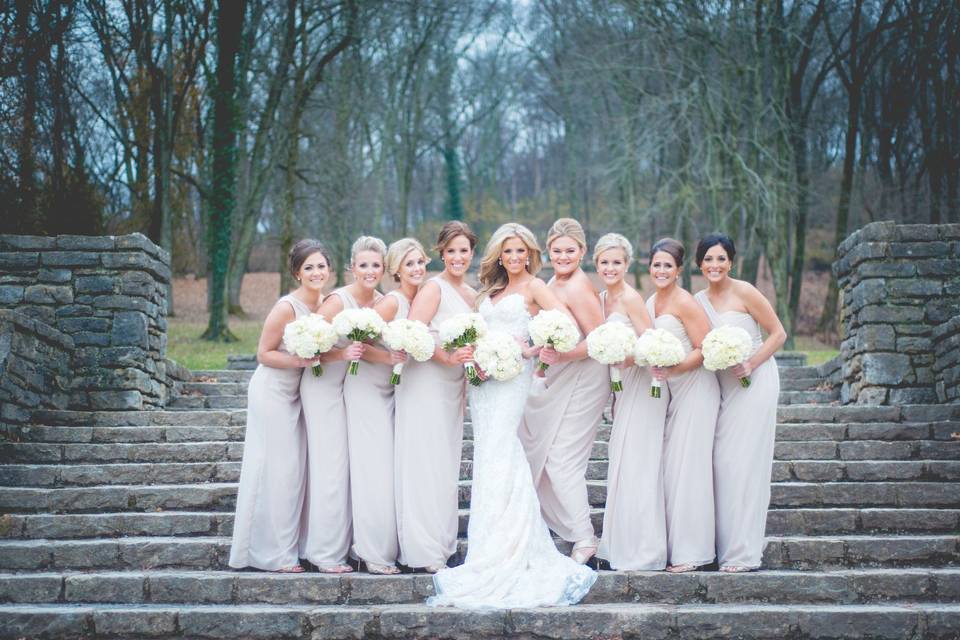 A smiling bridal party