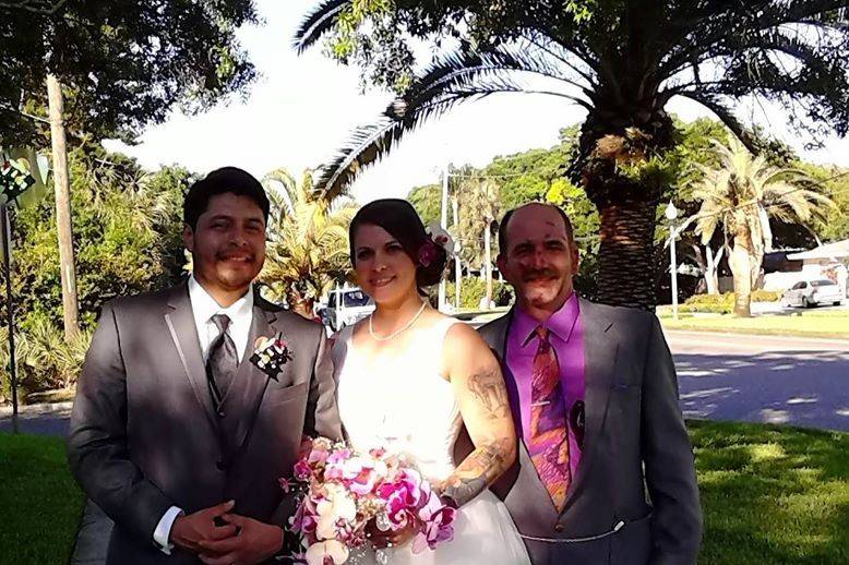 Newlyweds and the officiant