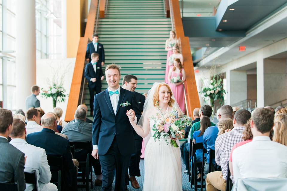 Couple walking down the aisle