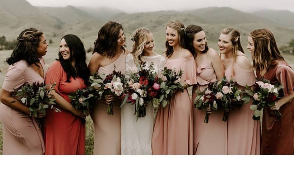 Bride and bridesmaids holding bouquets