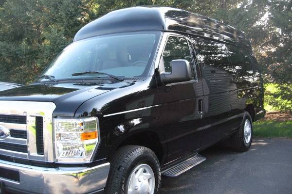 Exterior of our XLT Limo Van seats 6 pass.