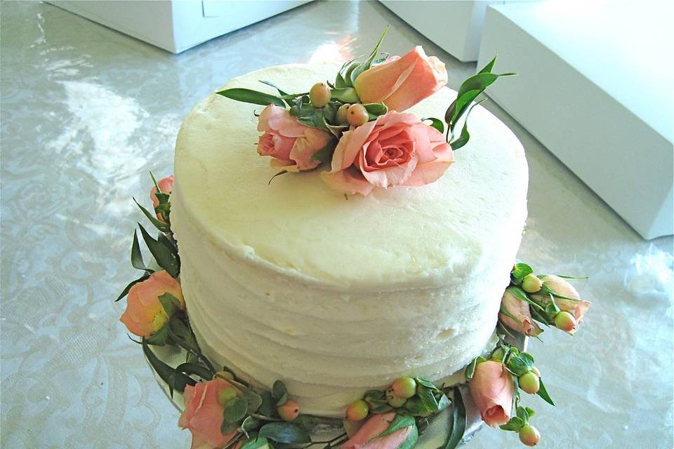 Small vintage rose wedding cake.  Frosted in a vintage style.