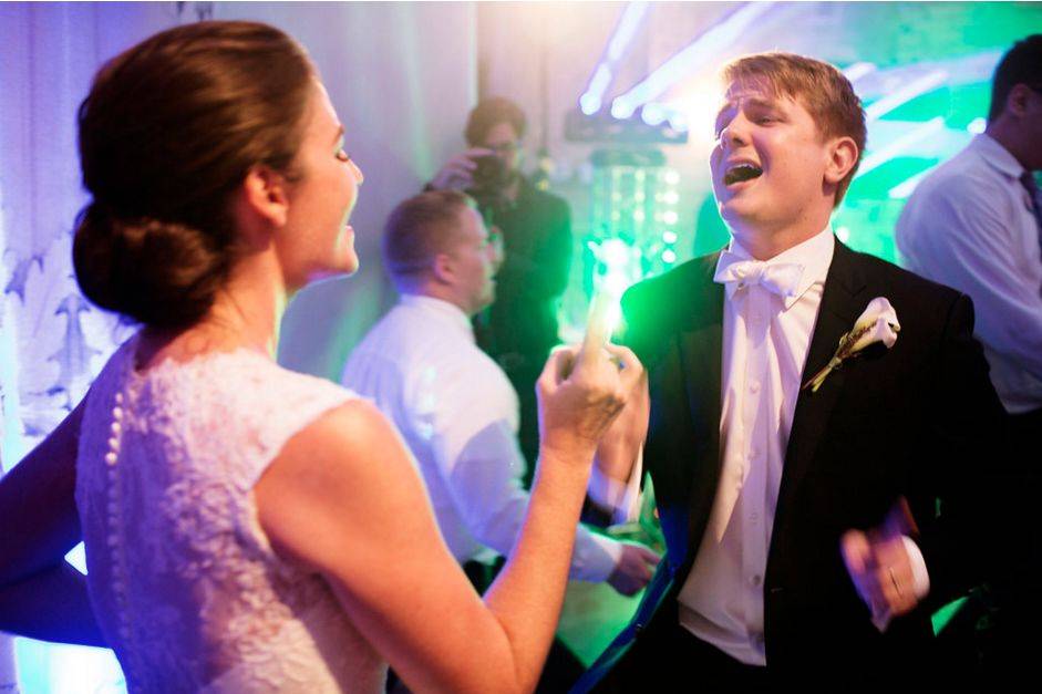Wedding couple having the time of their lives