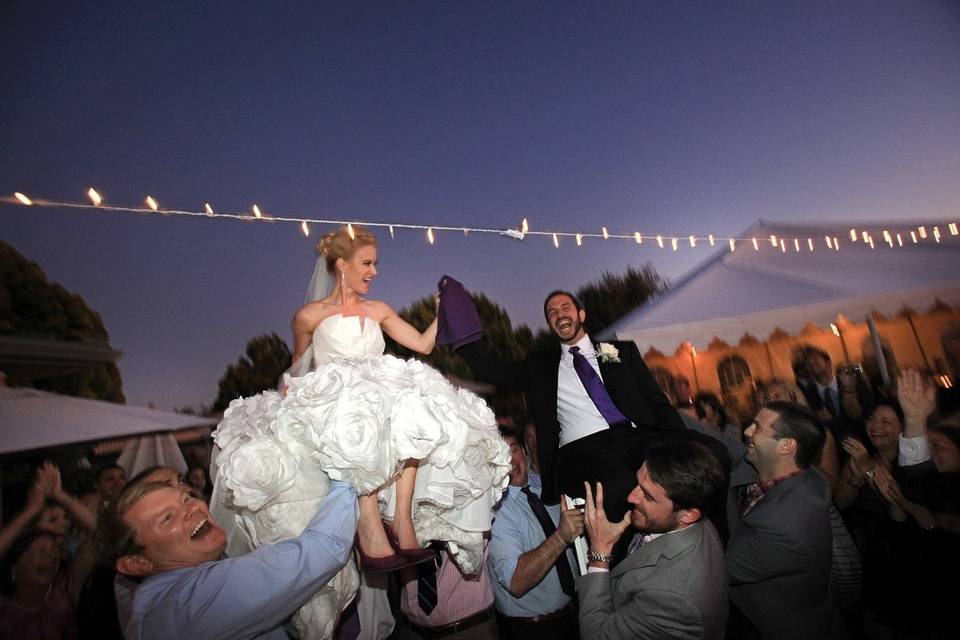 somehow the groom never goes up as high as the bride!