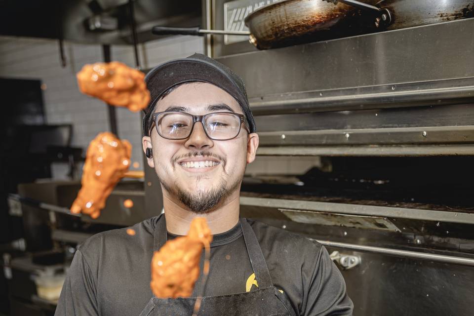Tossing Buffalo wings