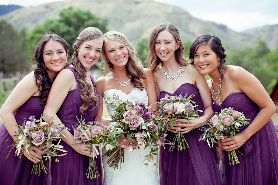 Bridal party holding bouquets