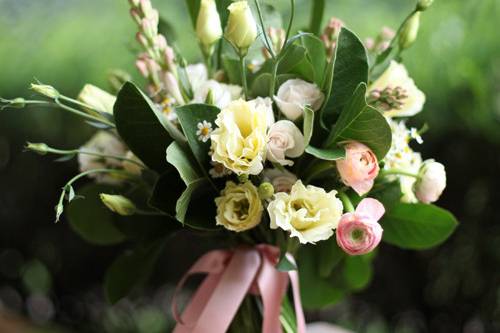 bridesmaids' bouquets with Maureen French tulips and a black lace and ivory satin stem wrap