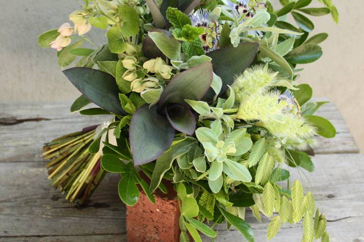 bridal bouquet with “Patience” David Austin garden roses, white lisianthus, white lilac, bupleurum and dusty miller