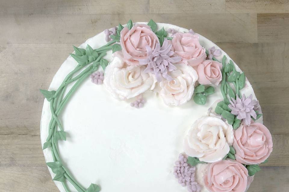 Floral topped wedding cake